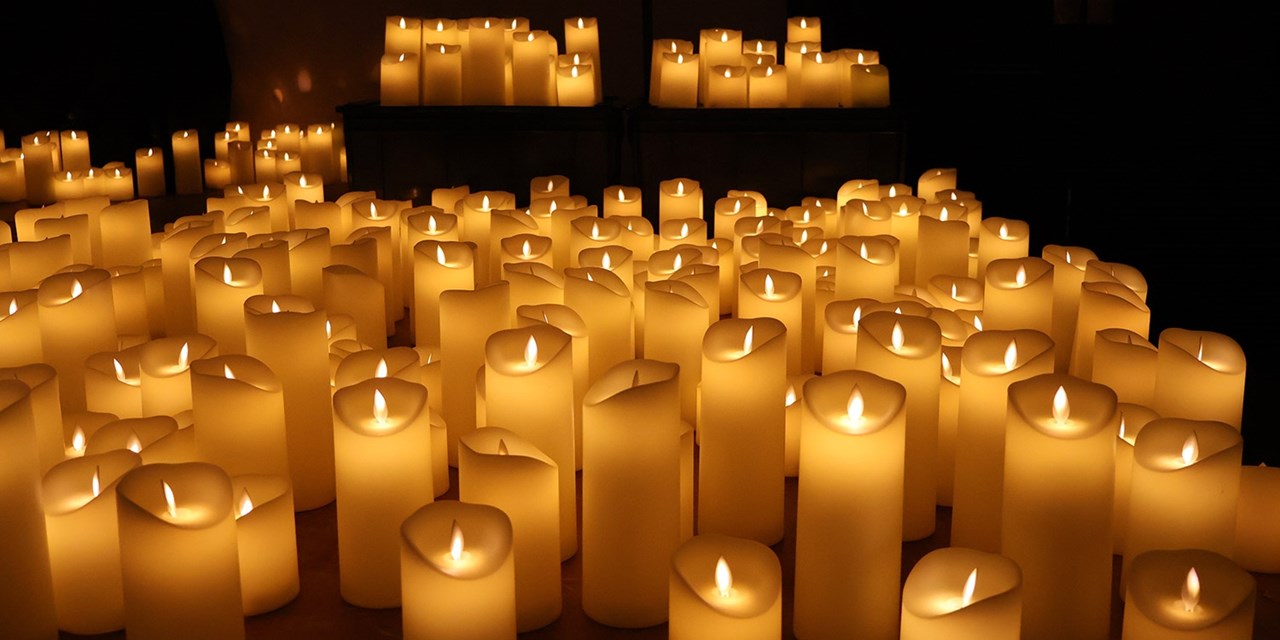 Enjoy the music beside the soft glow of candlelight