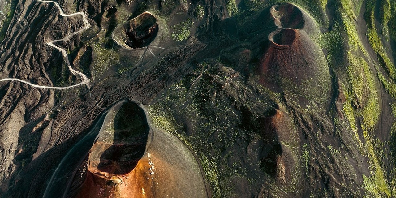 Volcanic craters on the slopes of Mount Etna in Sicily