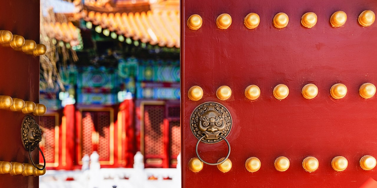 The Forbidden City features ornate red walls, a symbol of celebration