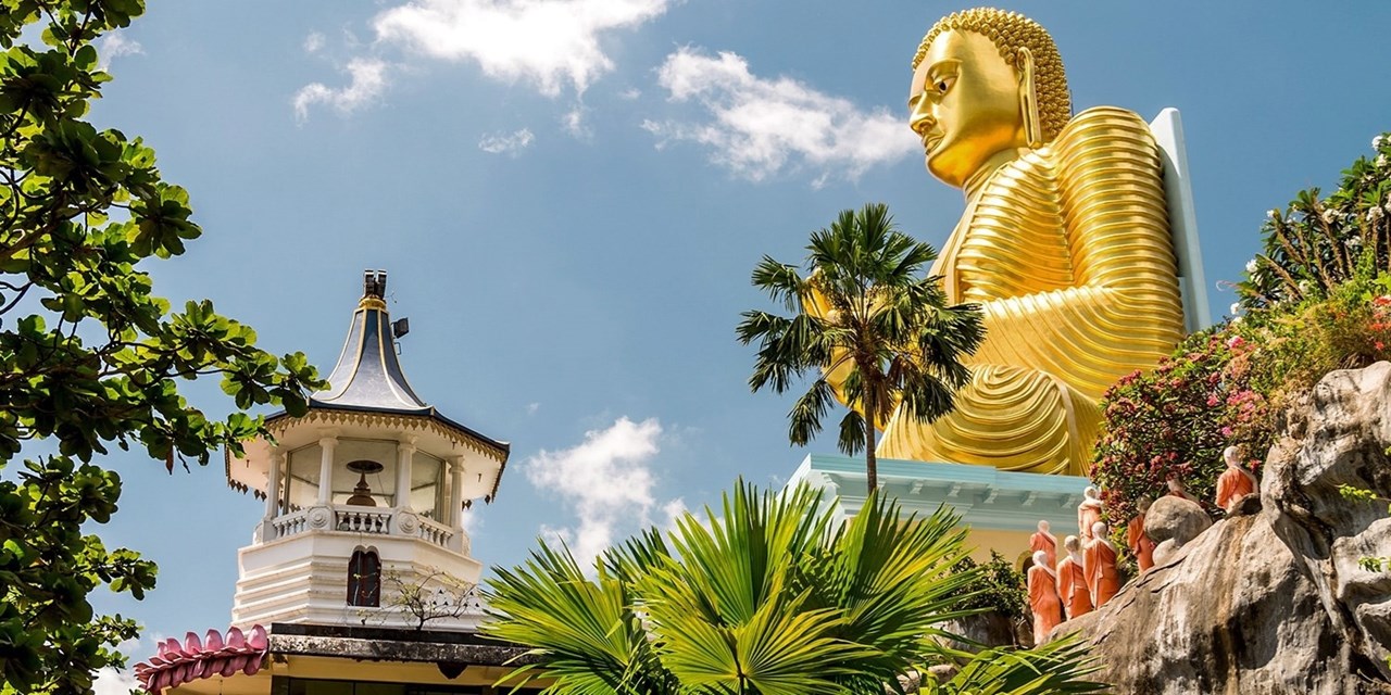 The shiny Golden Temple of Dambulla on a sunny day