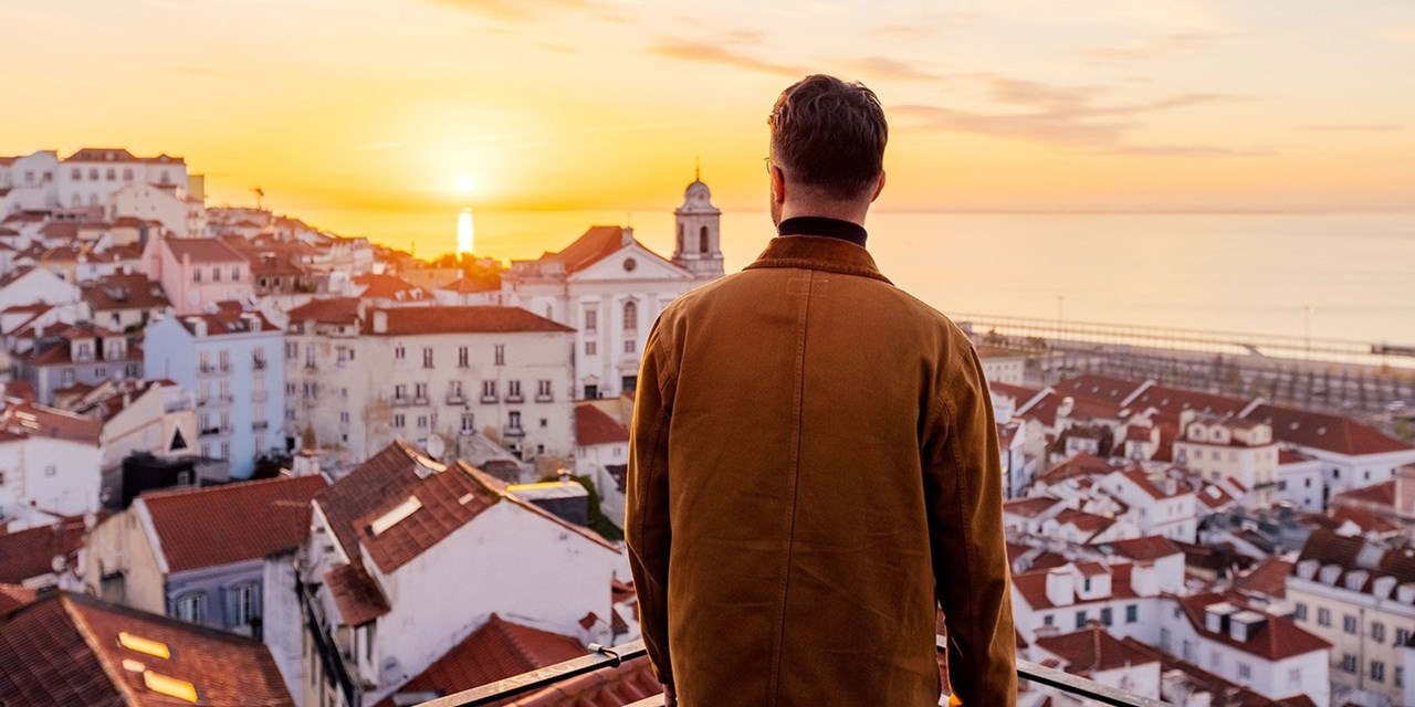 Wake up early for sunrise to get this cityscape view of Lisbon