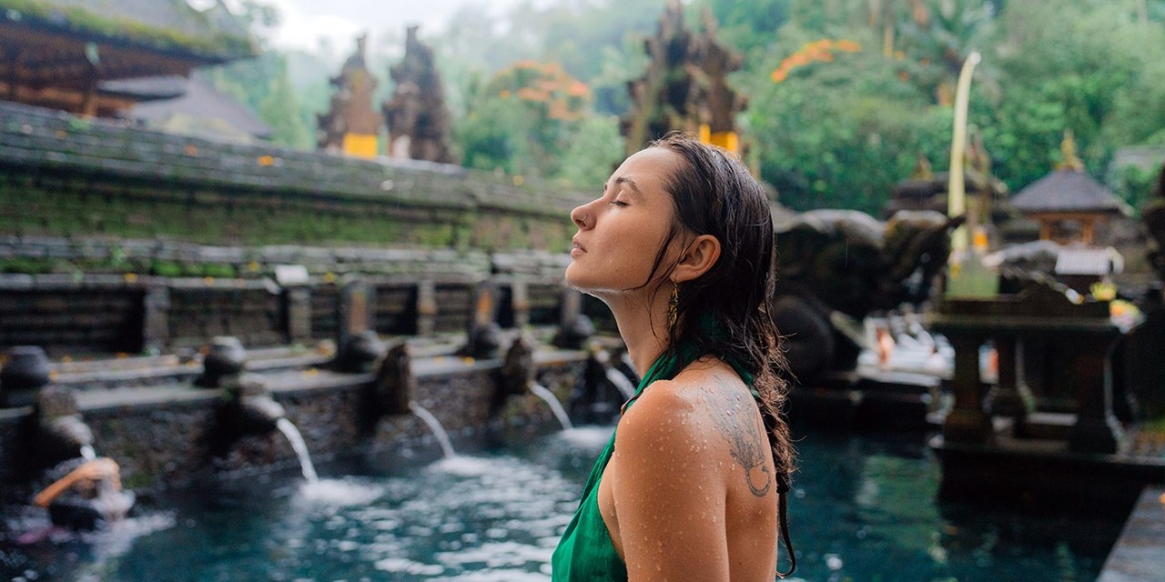 Head to the Tirta Empul Holy Water Temple for a traditional water purification ritual