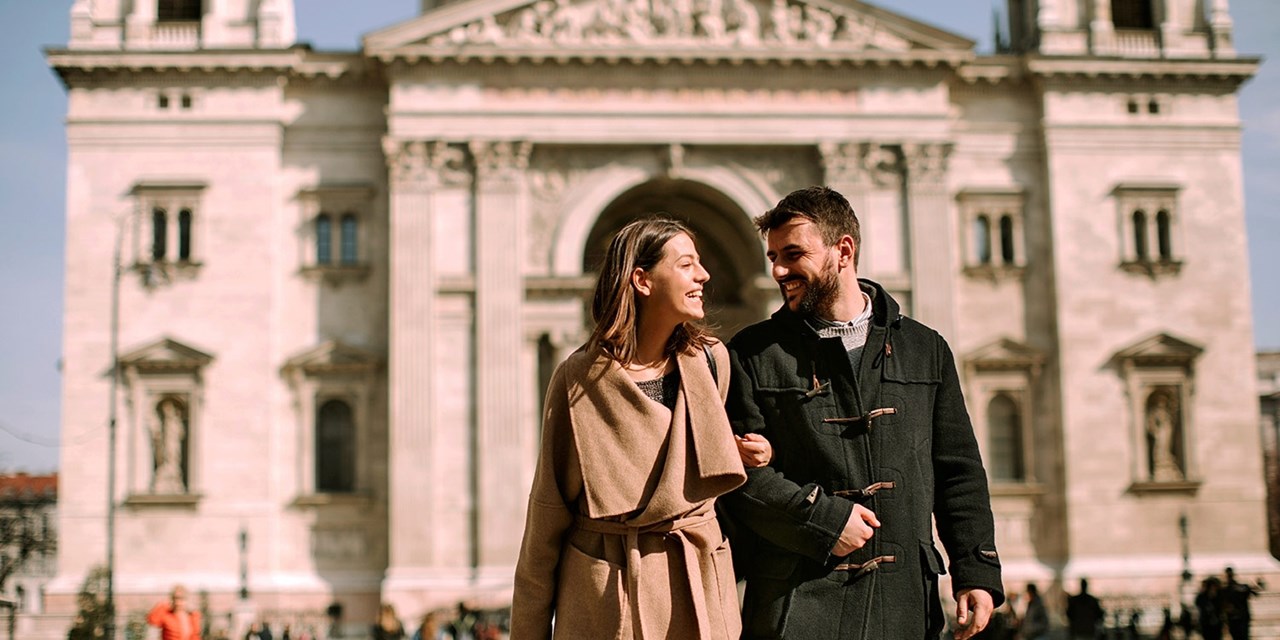 A couple visits St. Stephen's Basilica in Budapest
