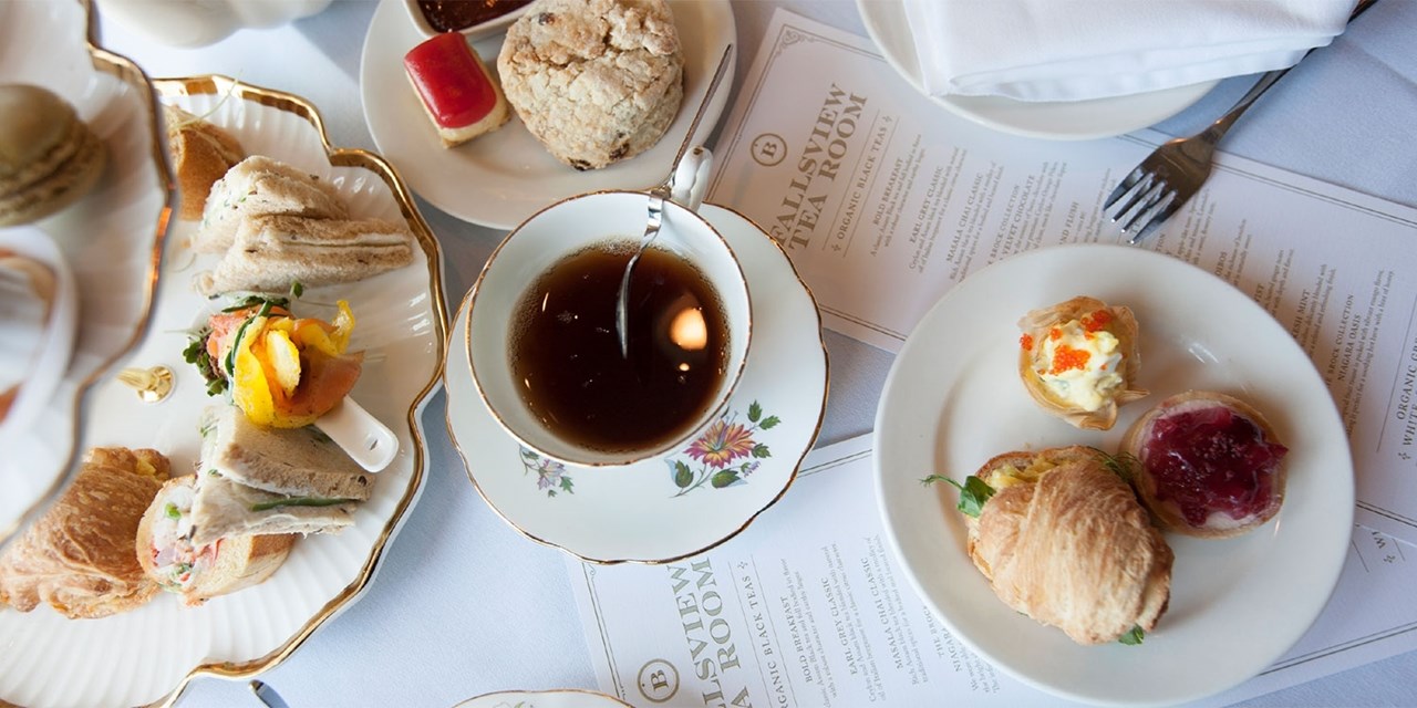 Savour premium organic teas, delicate finger sandwiches and pastries