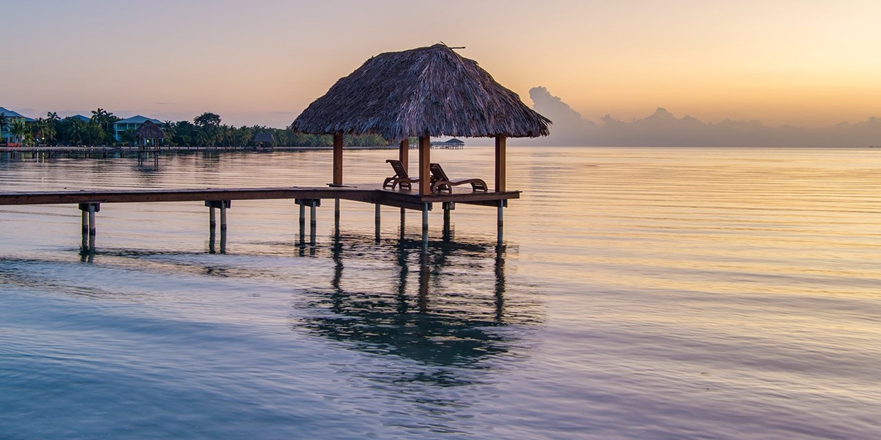 Admire a sunrise from the Playa de Coco Beach Pier