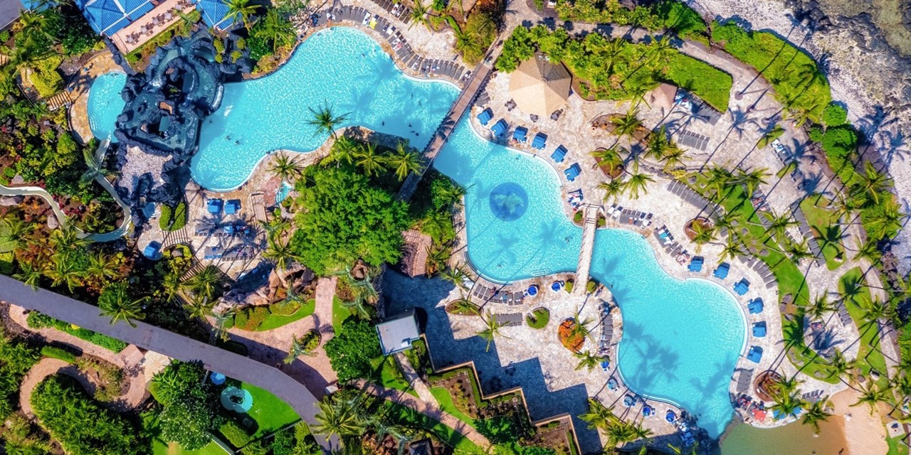 Take a break from the sand and find a spot by the pool 
