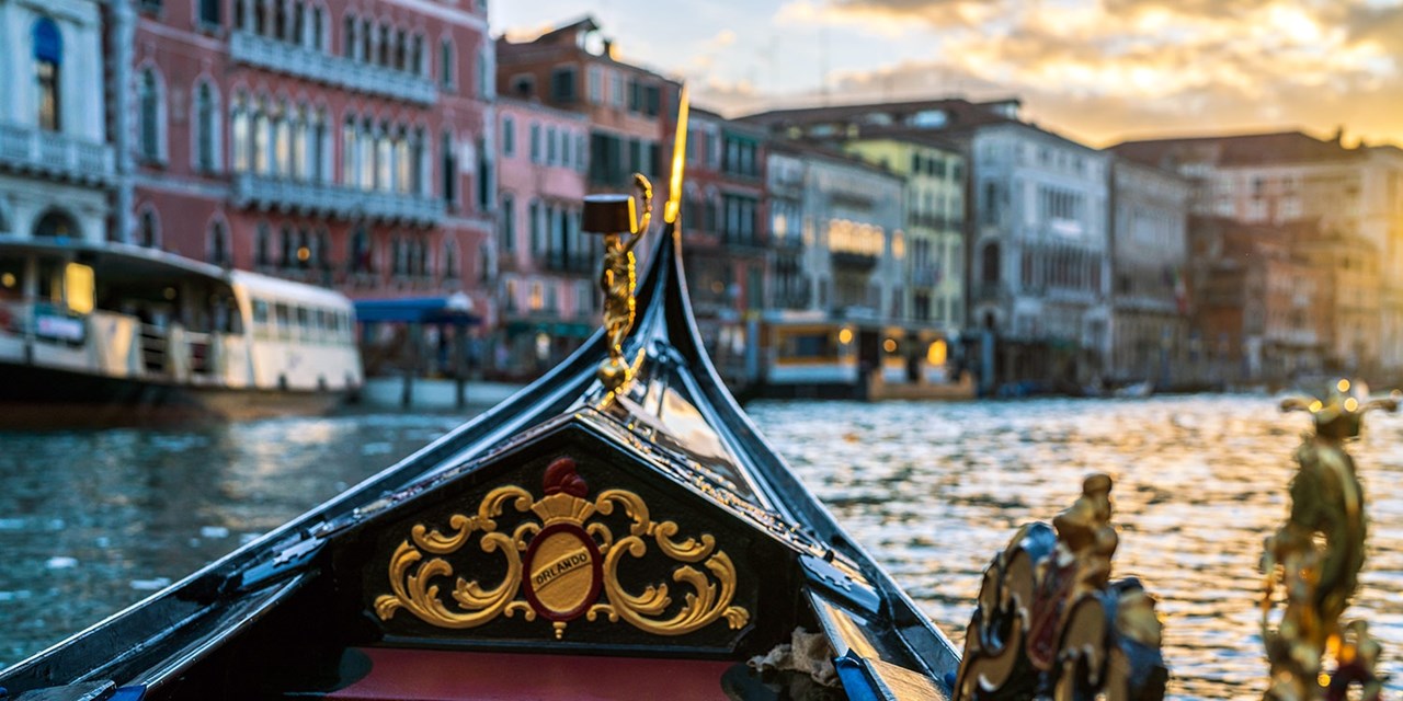 Explore Venice's canals on a gondola