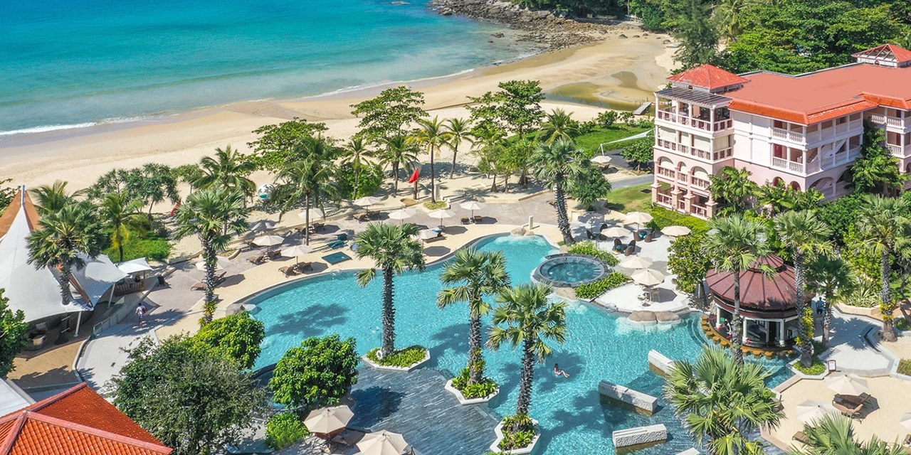 Overhead shot of pool, sand, and ocean