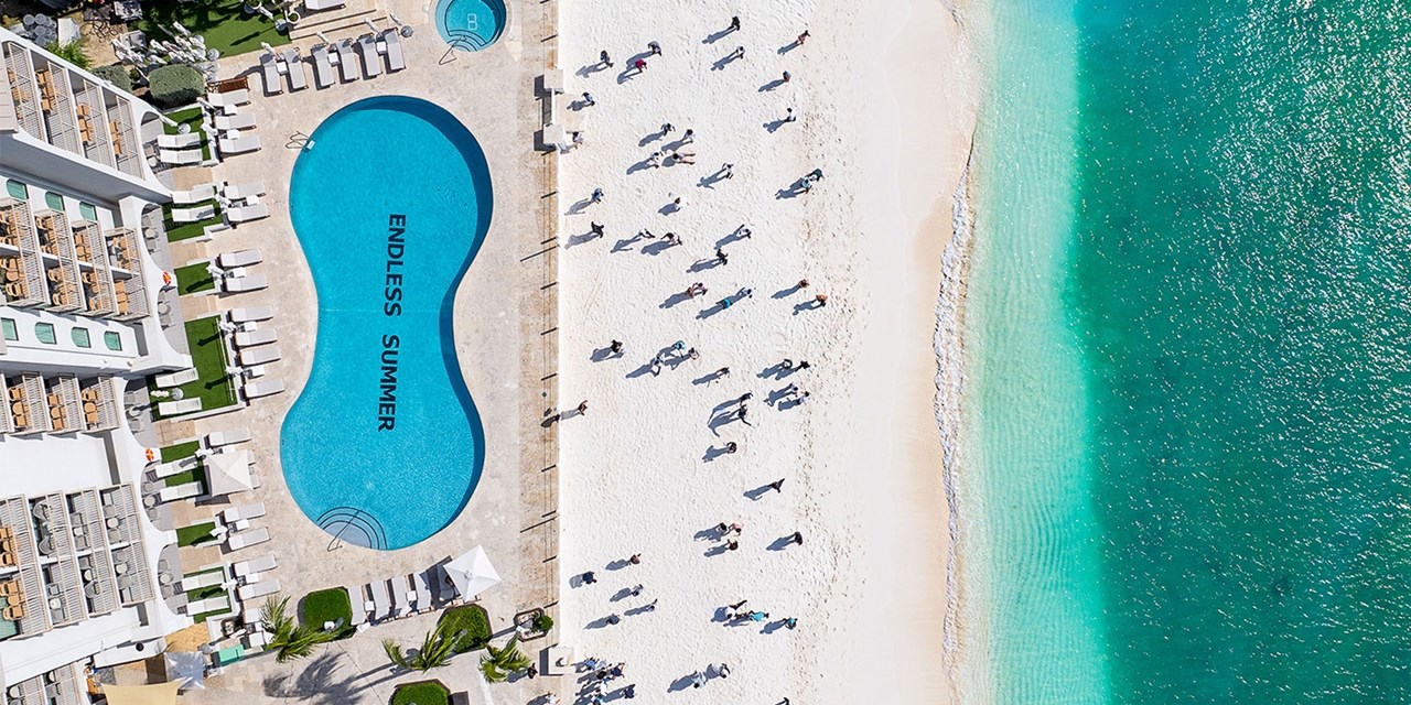 Unwind poolside with an ocean breeze