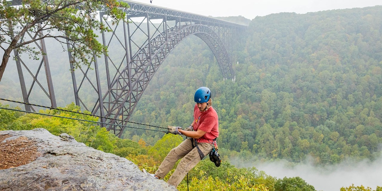 Climb at Bridge Buttress and check out the New River Gorge Bridge up close