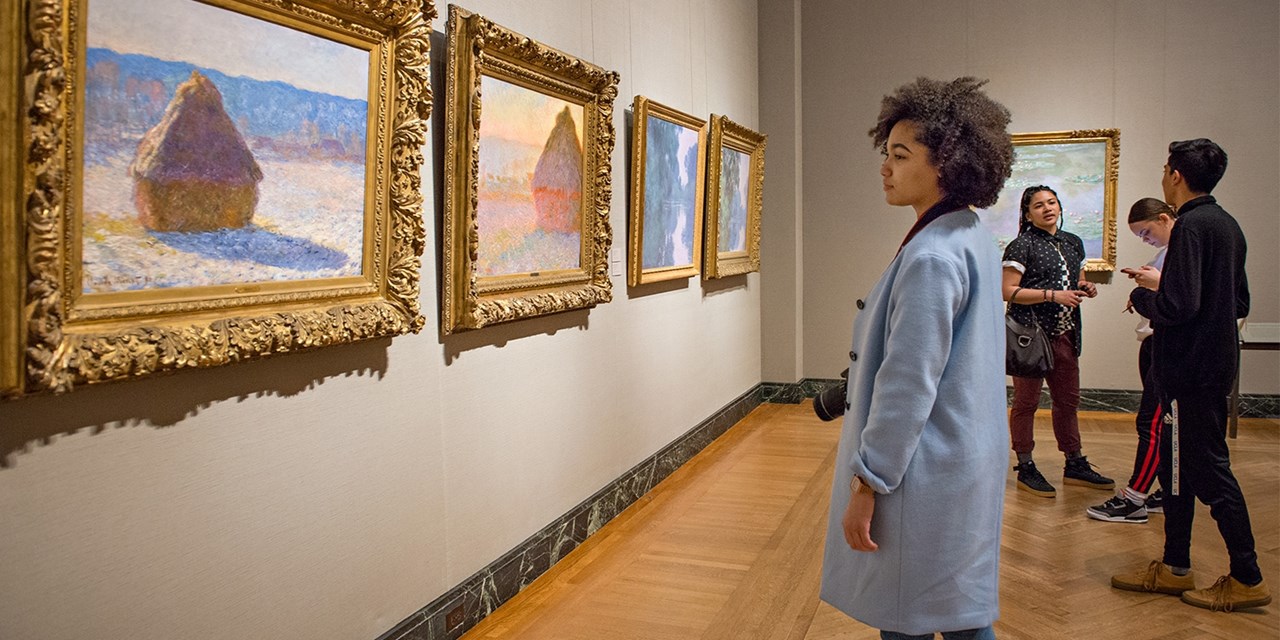 Monets hang in the Museum of Fine Art