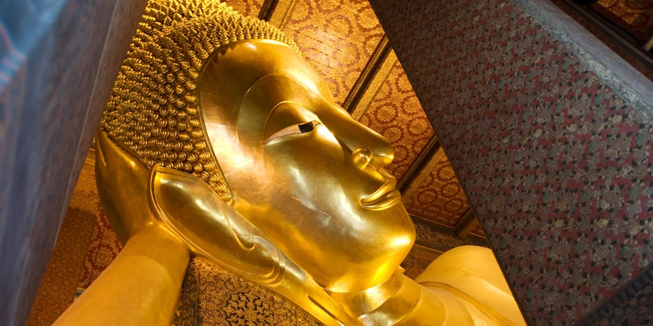 Admire The Temple of the Reclining Buddha in Bangkok