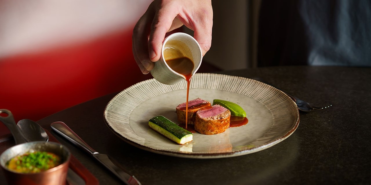 The restaurant holds three Rosettes and a Michelin Star