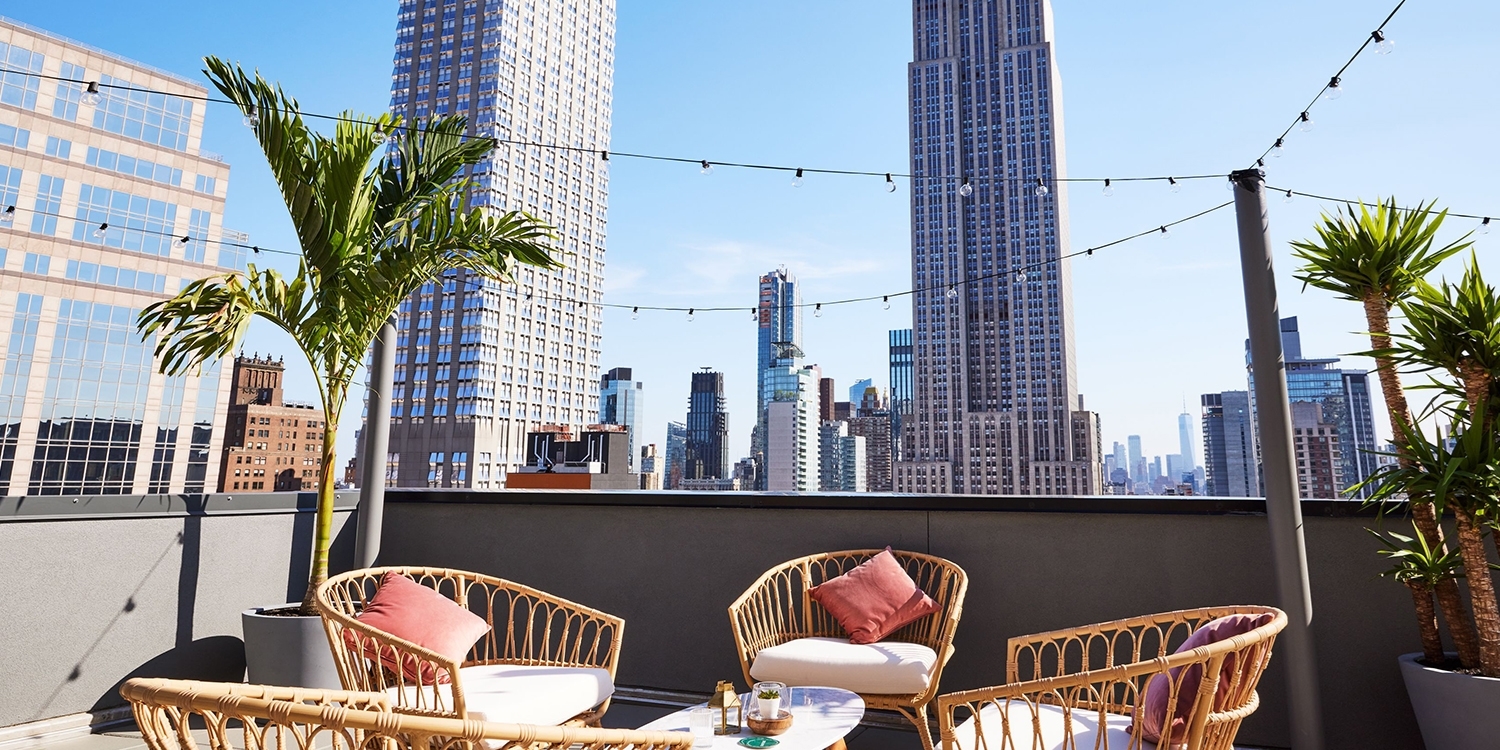The rooftop bar offers stellar views of the Empire State Building and Manhattan