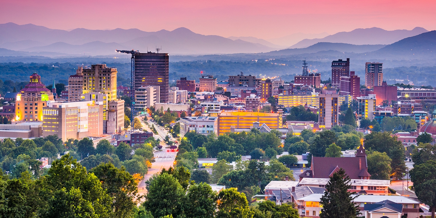 You can't beat Asheville’s blend of historic buildings and distant mountains at sunset