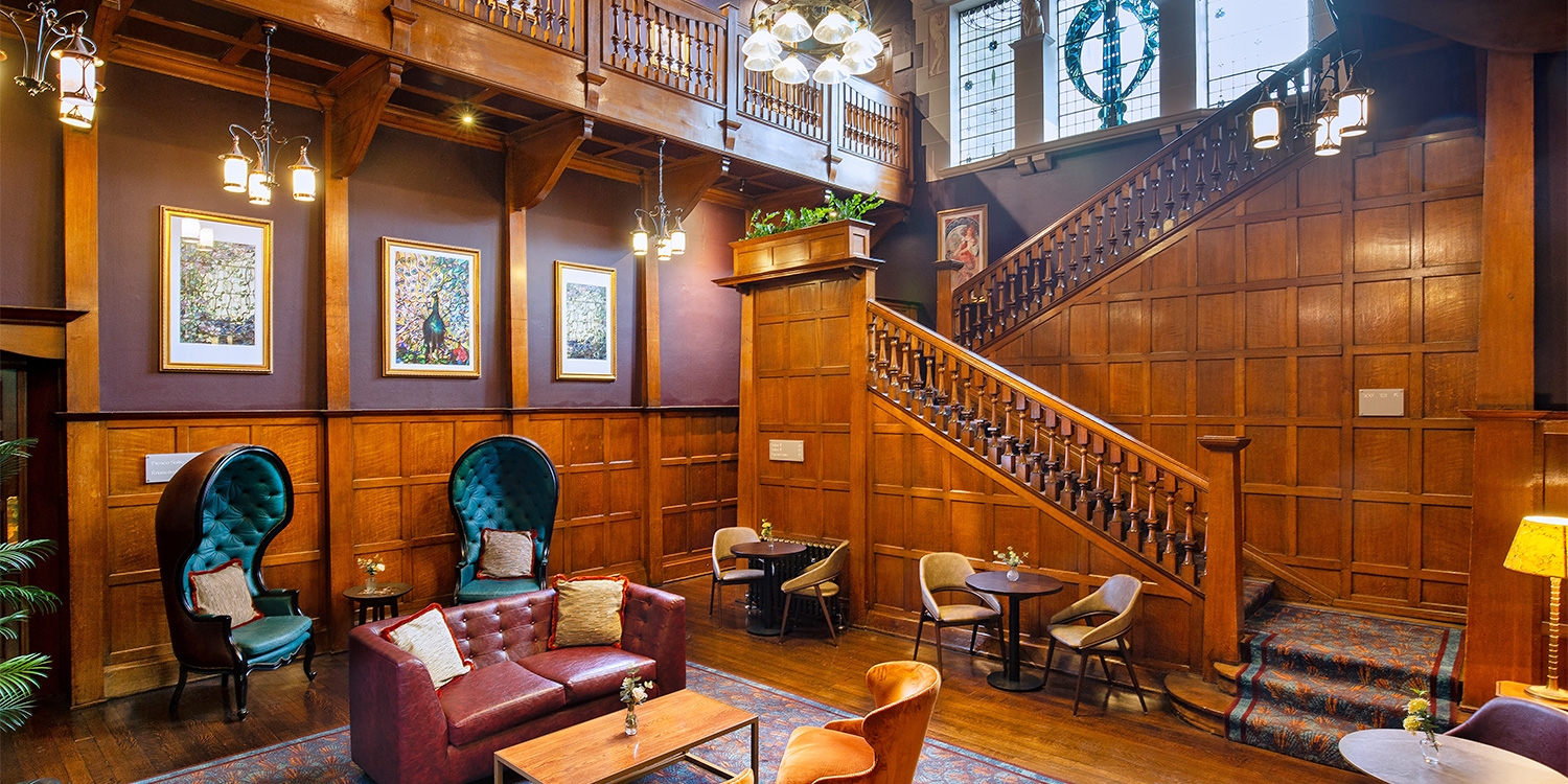 The property has an extensive Art Nouveau collection of murals, stained-glass windows, stencilled wallpaper, and wood panelling