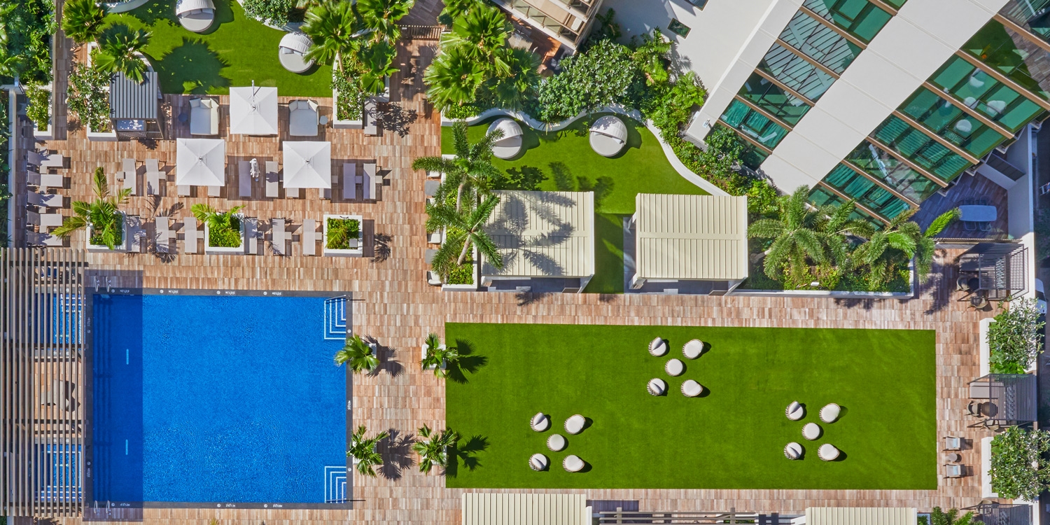 This Honolulu oasis has an expansive 8th-floor amenity deck with pools and activities