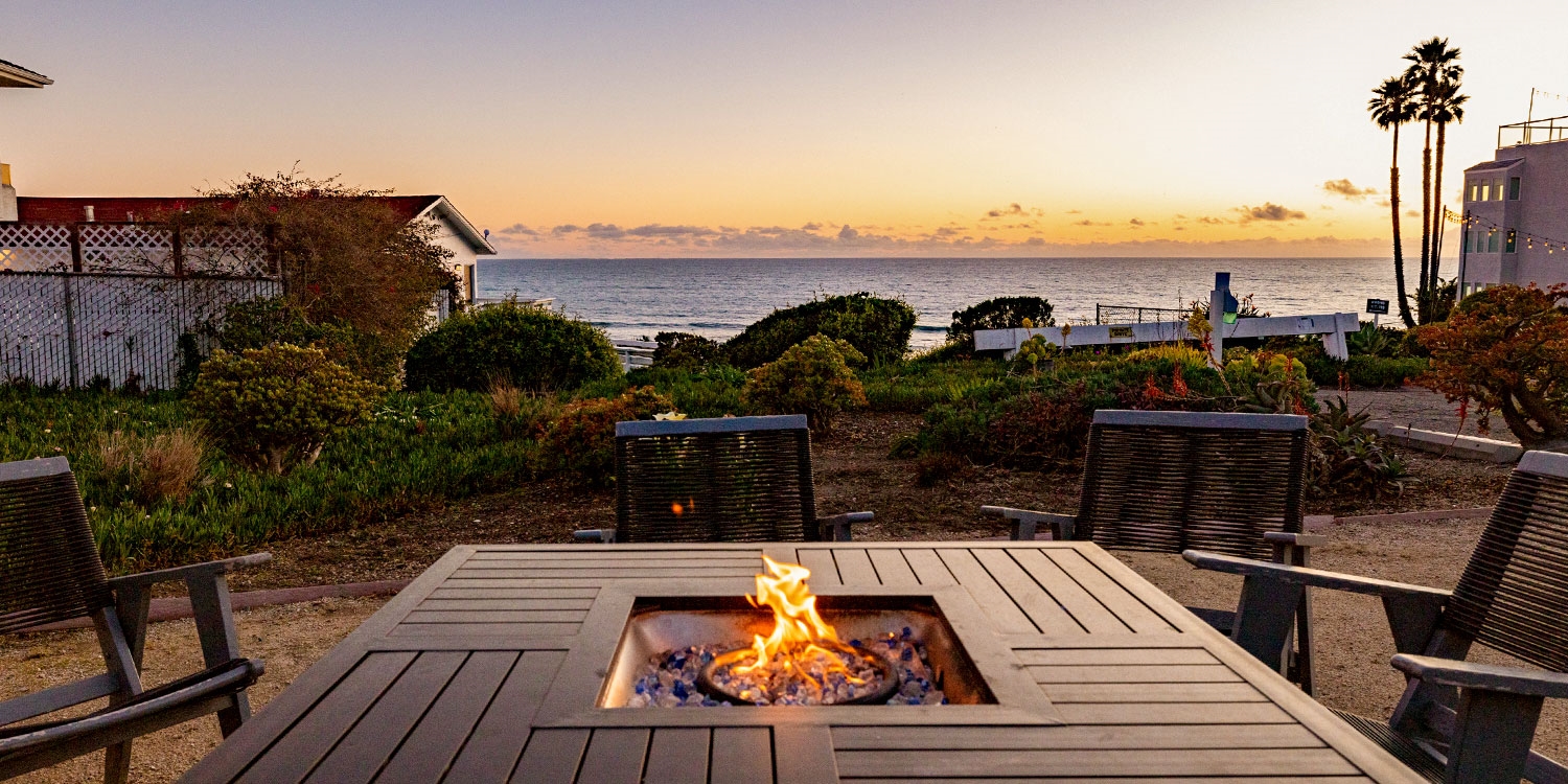 Watch the sun set over the ocean and share stories under the stars