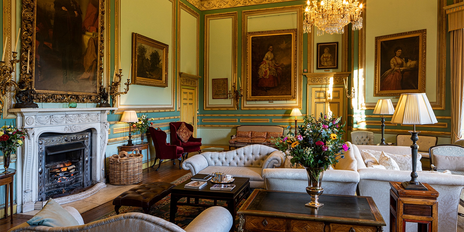 Relax in opulent "chandelier-lit drawing rooms with gold-gilded portraits" (The Times)