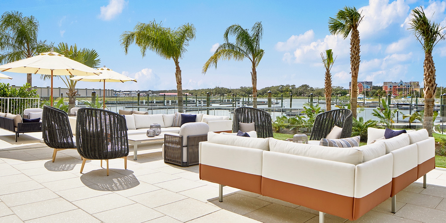 Gather outdoors on the patio with water views
