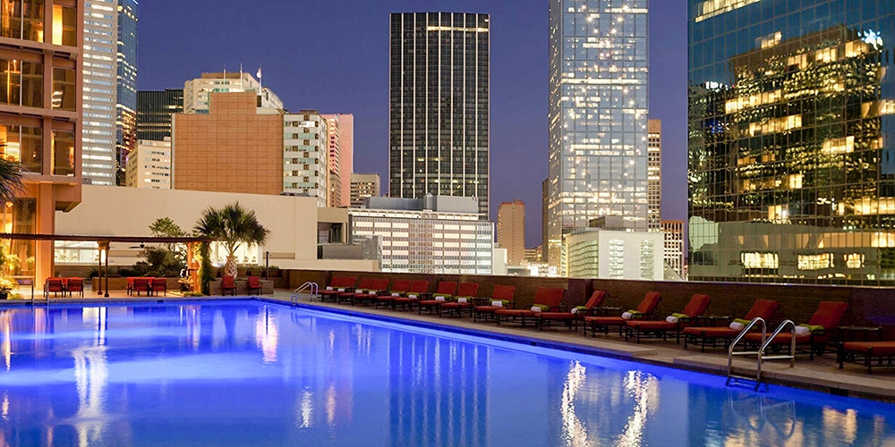 Your summer Dallas trip comes with a rooftop pool at this hotel