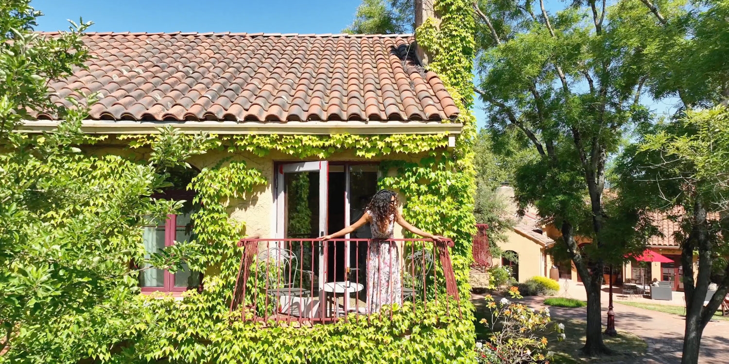 Unwind on your private patio or balcony with a glass of wine (or two)