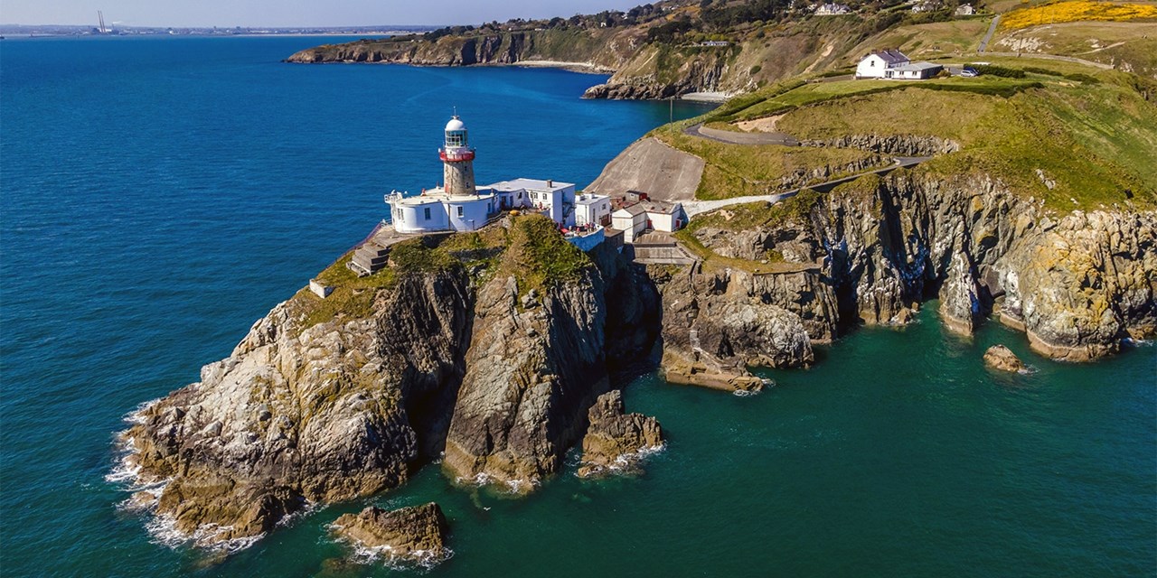 The quaint fishing village of Howth, with its lighthouse, is about 20 minutes' drive down the coast