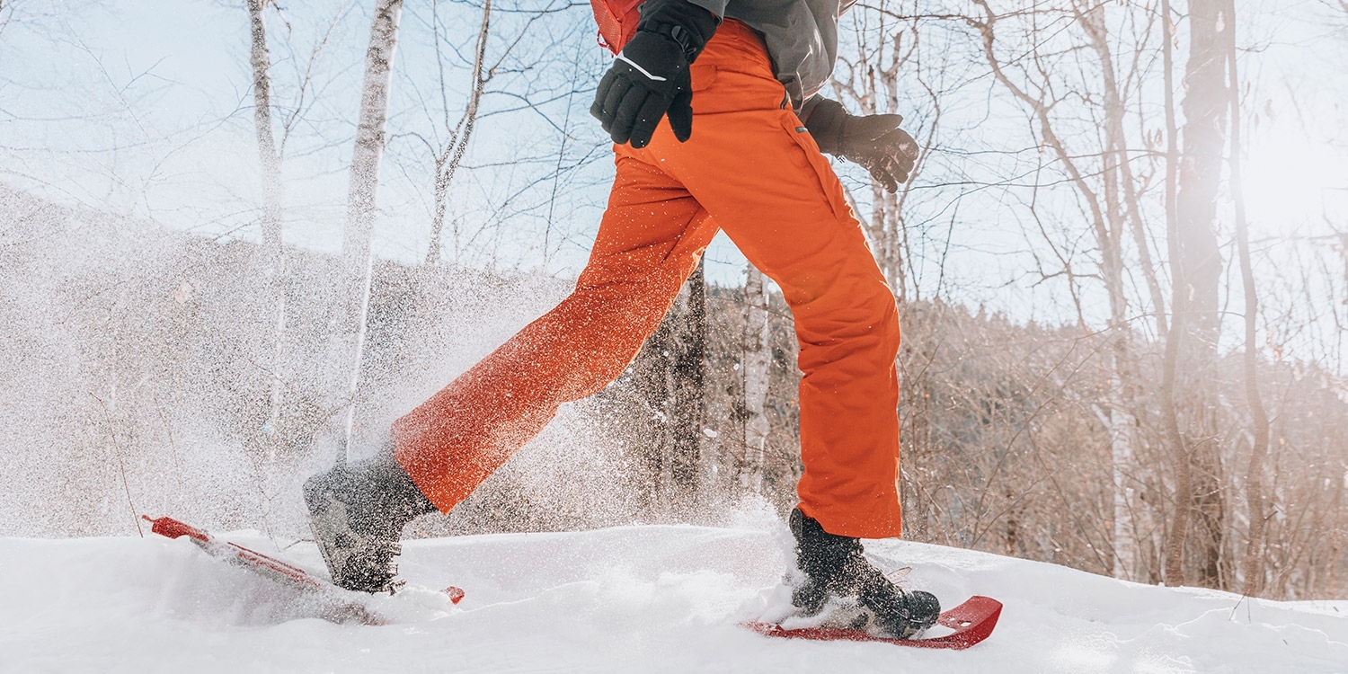 Explore miles of peaceful winter trails while snowshoeing from the resort